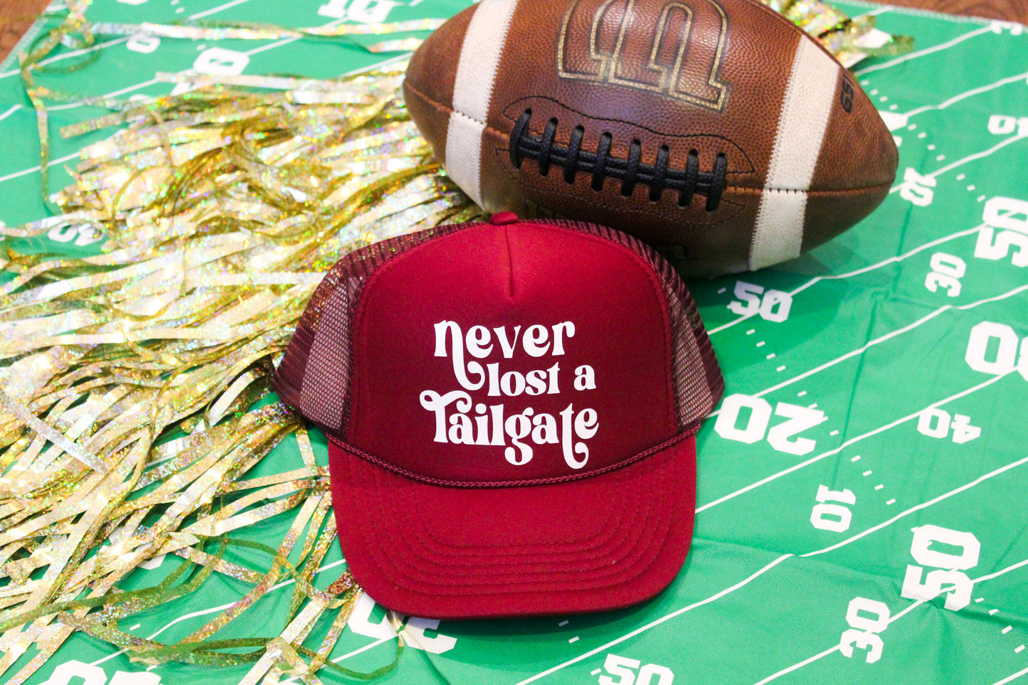 Never Lost a Tailgate Maroon Trucker Hat